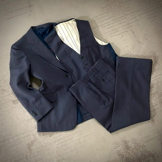 Good condition three-piece suit herringbone light blue